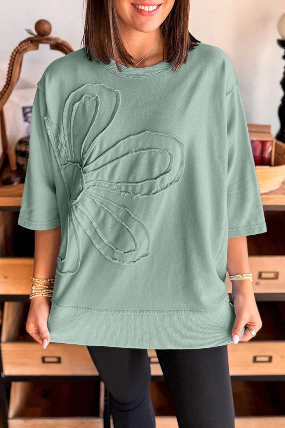 Clearly Aqua Floral Patched Half Sleeve Tunic Top